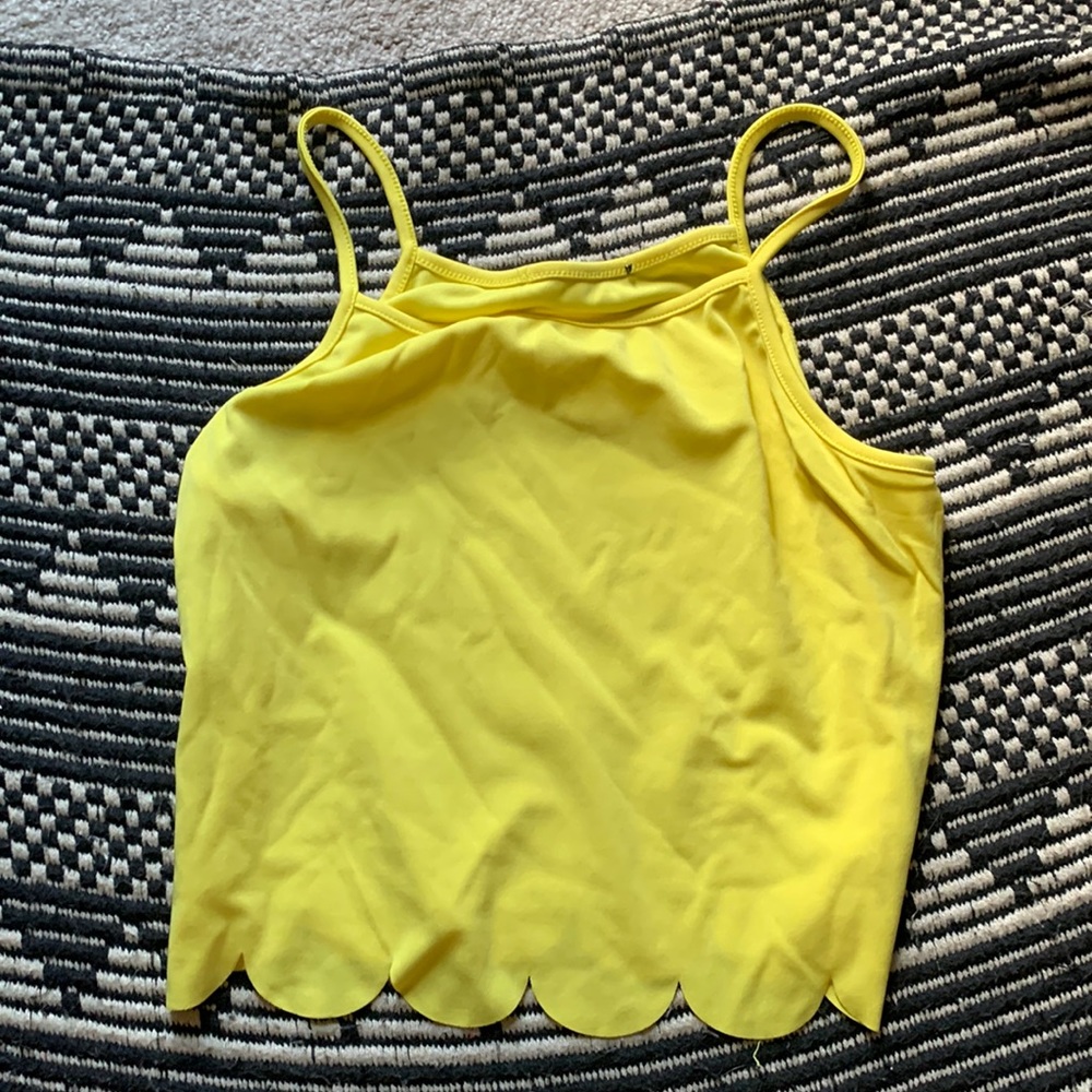 Yellow “daisy” shirt .